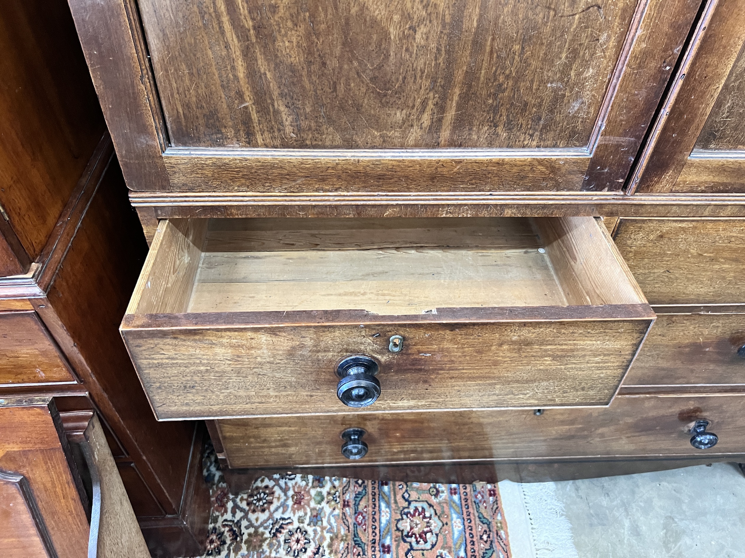 A George III mahogany linen press, width 130cm, depth 60cm, height 200cm